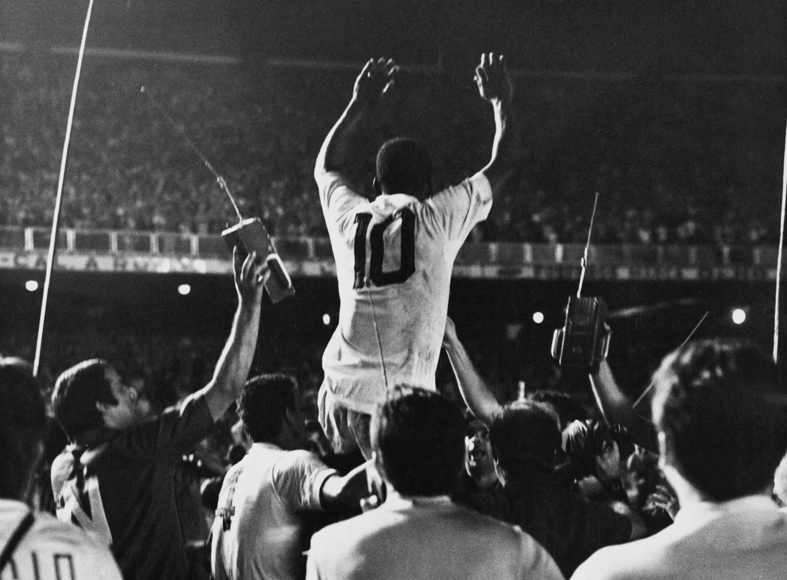 Pele celebrates scoring the 1,000th goal of his career in 1969.