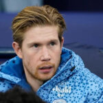 Kevin De Bruyne playing for Manchester City, listed among the highest paid Premier League players in 2024.