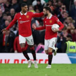 Bruno Fernandes of Manchester United celebrates with Marcus Rashford after scoring the team