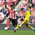 Football Player Strengthening Legs