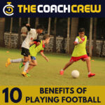 Footballer running on the field, showcasing cardiovascular activity