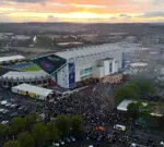 Thousands of fans outside Leeds United celebrating their promotion back to the Premier League