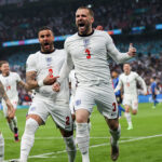 Luke Shaw celebrates scoring the opening goal against Italy