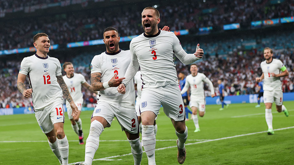 Luke Shaw celebrates scoring the opening goal against Italy