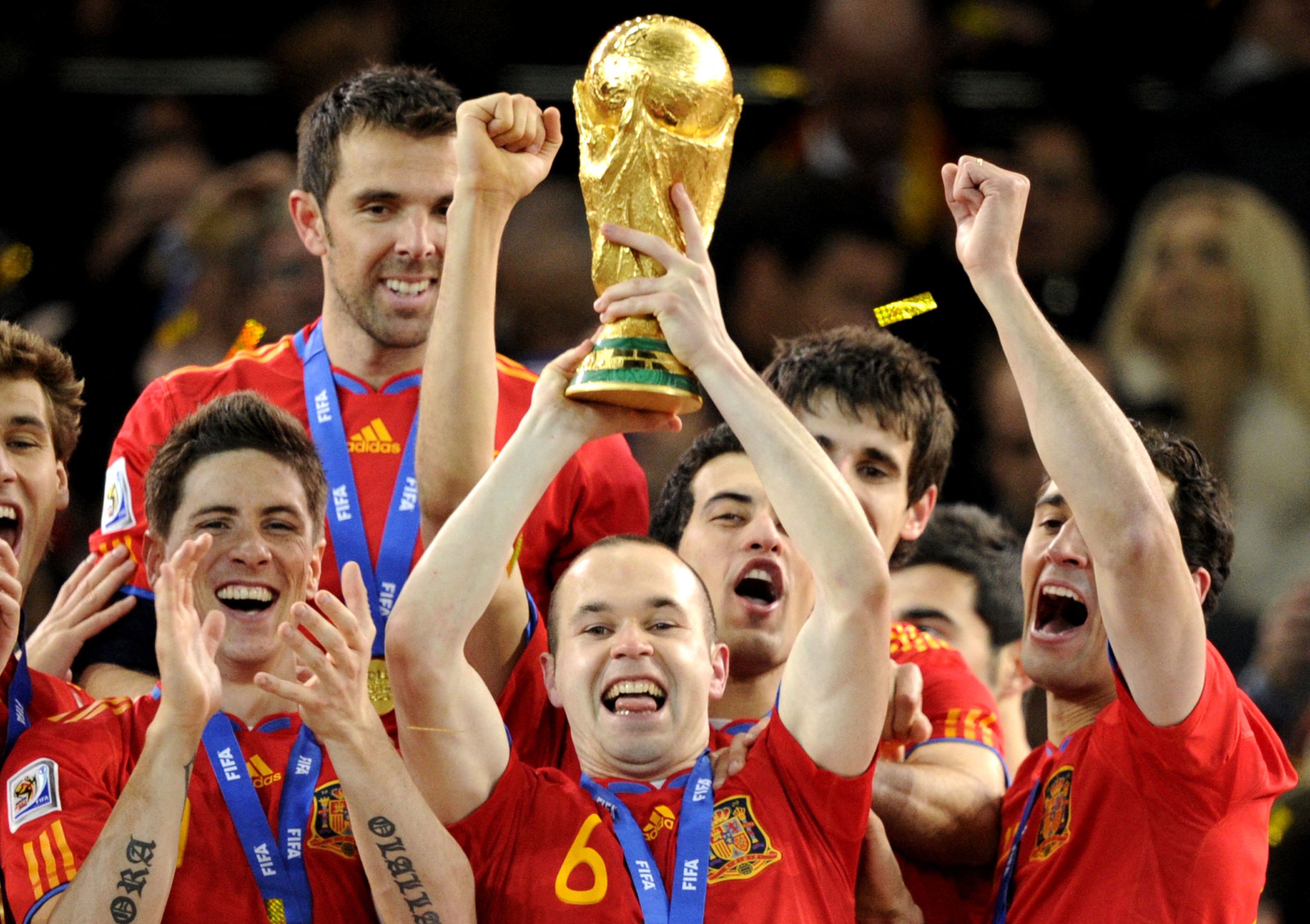 Andres Iniesta celebrating a victory with Spain