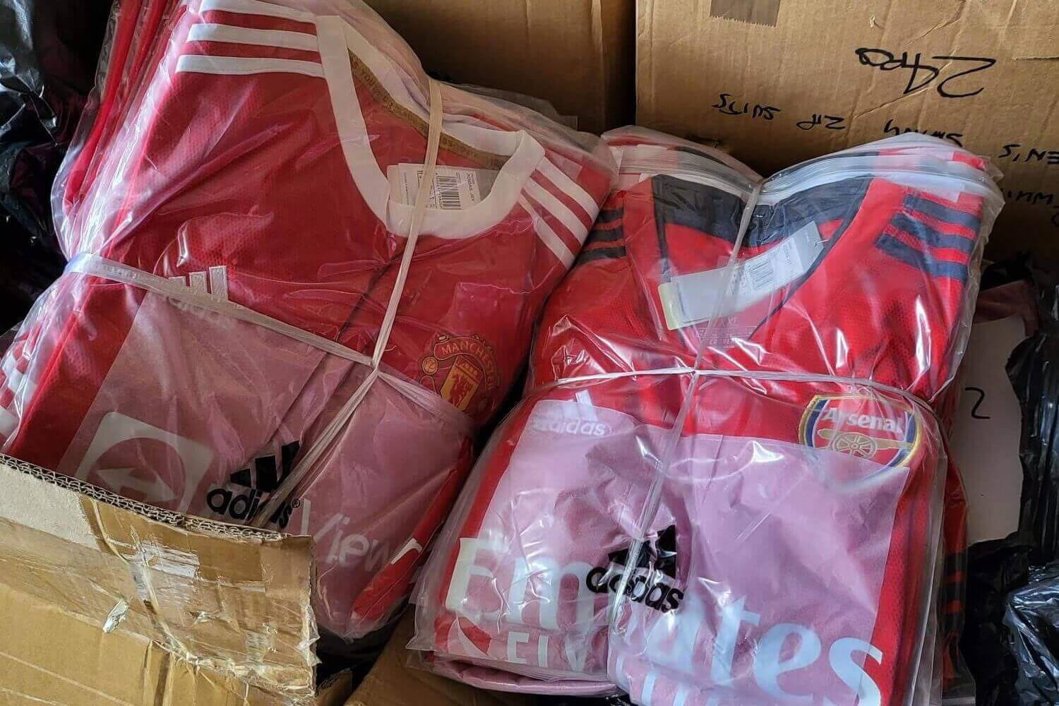 Police seized fake shirts like these in Manchester’s Cheetham Hill
