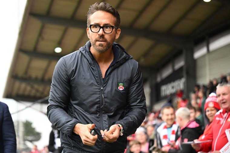 Ryan Reynolds walks the pitch at Wrexham AFC