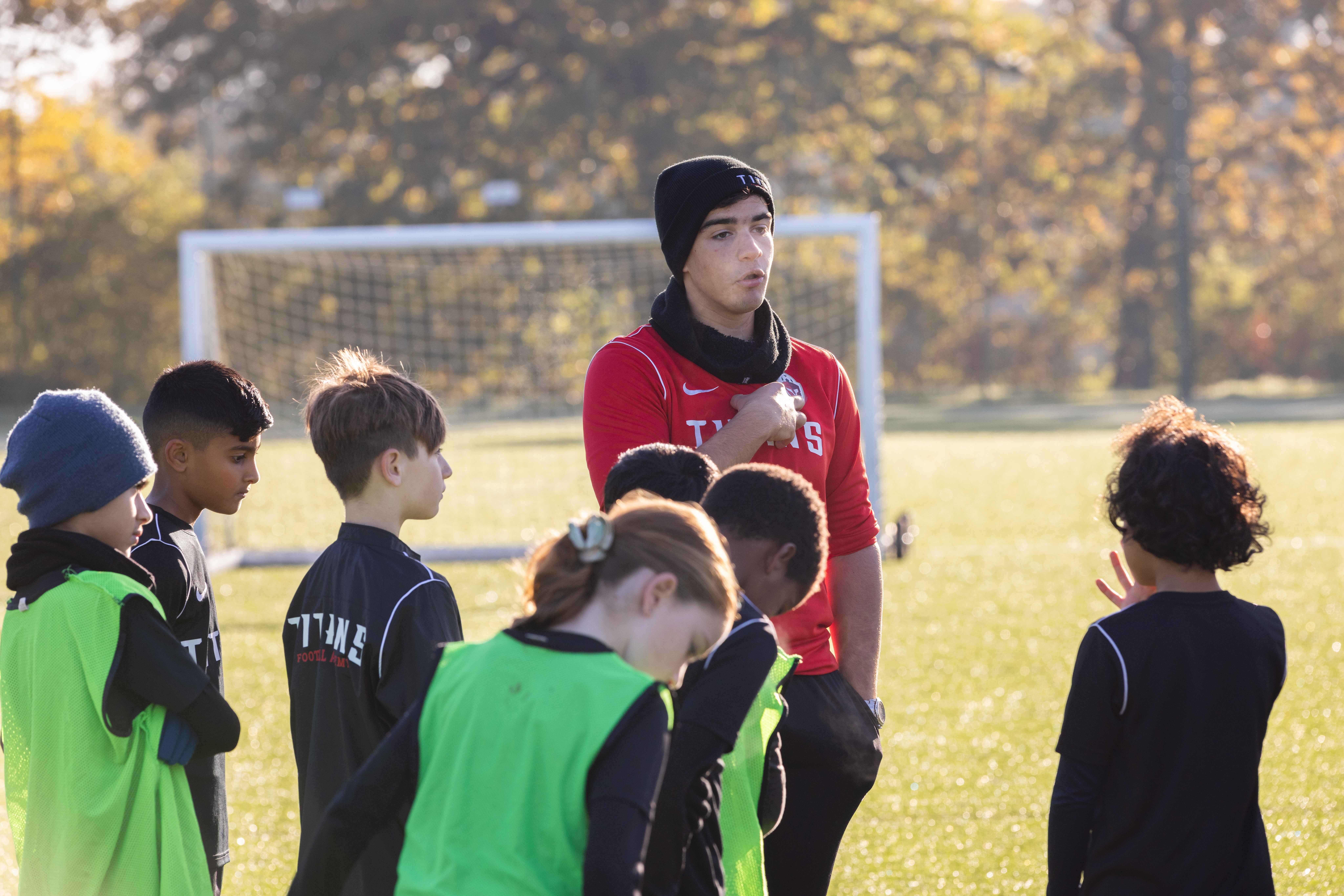 Young football players training