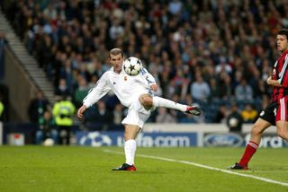 Zinedine Zidane scores with a stunning volley for Real Madrid in the 2002 Champions League final against Bayer Leverkusen at Hampden Park, Glasgow