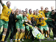 Norwich celebrate after winning the League One title by beating Gillingham