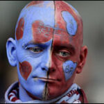 A Burnley fan looks dejected after their relegation is confirmed