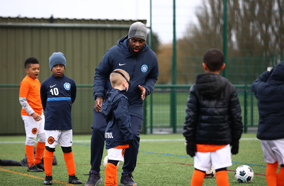 Coach with players