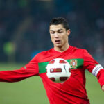 Cristiano Ronaldo playing for Portugal, benefiting from sponsorships.