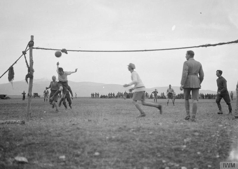 1916. A handmade football net is setup by soldiers for an inter-company match on the Balkan Front on Christmas Day. Imperial War Museum via Open University