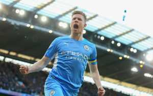 Kevin de Bruyne of Manchester City celebrates after scoring the opening goal during the Premier League match between Manchester City and Manchester United at Etihad Stadium on March 6, 2022 in Manchester, United Kingdom.