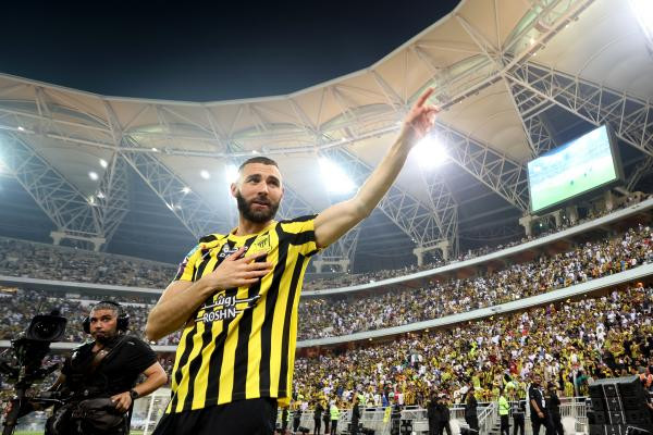 Karim Benzema acknowledges the fans as they are presented to the crowd during the Karim Benzema Official Reception event at King Abdullah Sports City on June 08, 2023 in Jeddah, Saudi Arabia.