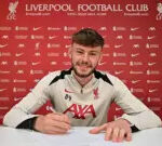 Conor Bradley celebrating a Liverpool victory