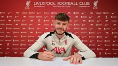 Conor Bradley celebrating a Liverpool victory