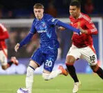 Cole Palmer and Casemiro battle for the ball
