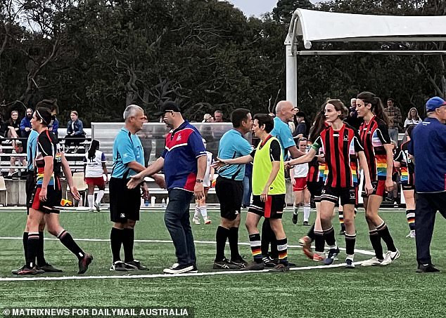 The West Pennant Hills Cherrybrook Football Club and Flying Bats players shake hands after the grand final