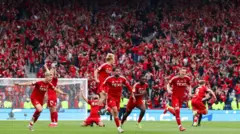 Aberdeen players celebrate their cup final victory
