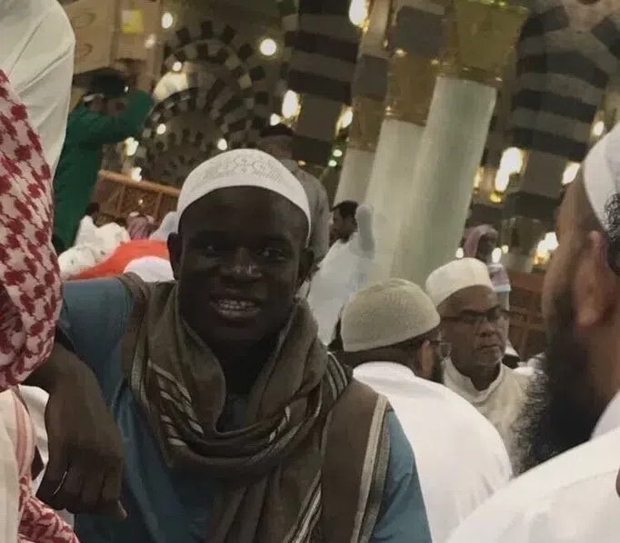 N'Golo Kanté in Al-Ittihad jersey, smiling on the field