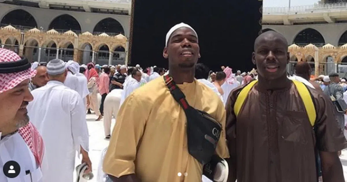 Paul Pogba in a traditional Muslim outfit, visiting Mecca