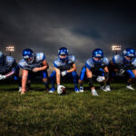 Football player holding gloves
