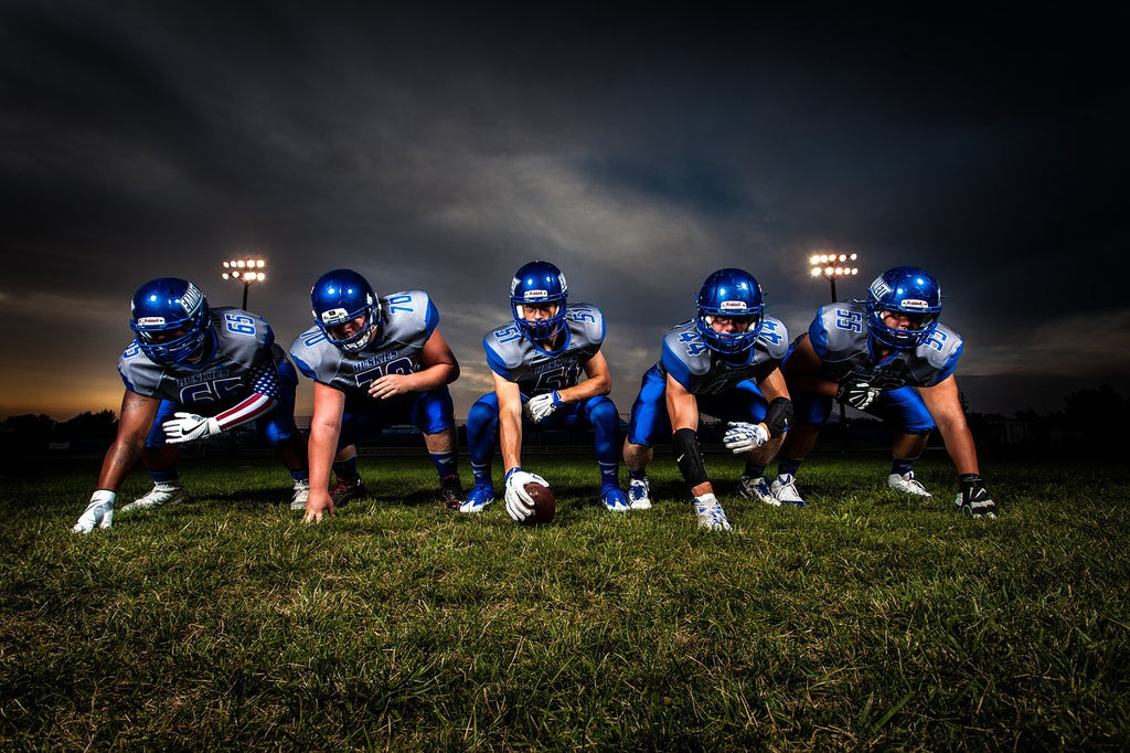 Football player holding gloves