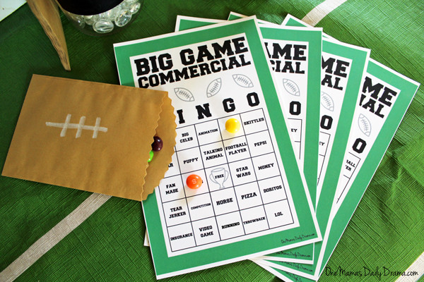 big game commercial bingo cards and a brown football bag with Skittle coming out