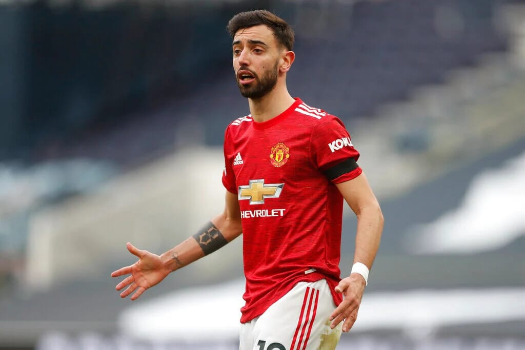 Bruno Fernandes celebrating a goal for Manchester United, one of the highest paid Premier League players.