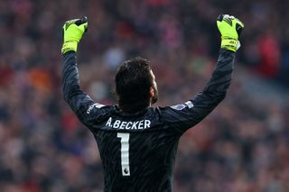 Alisson of Liverpool celebrates against Wolves