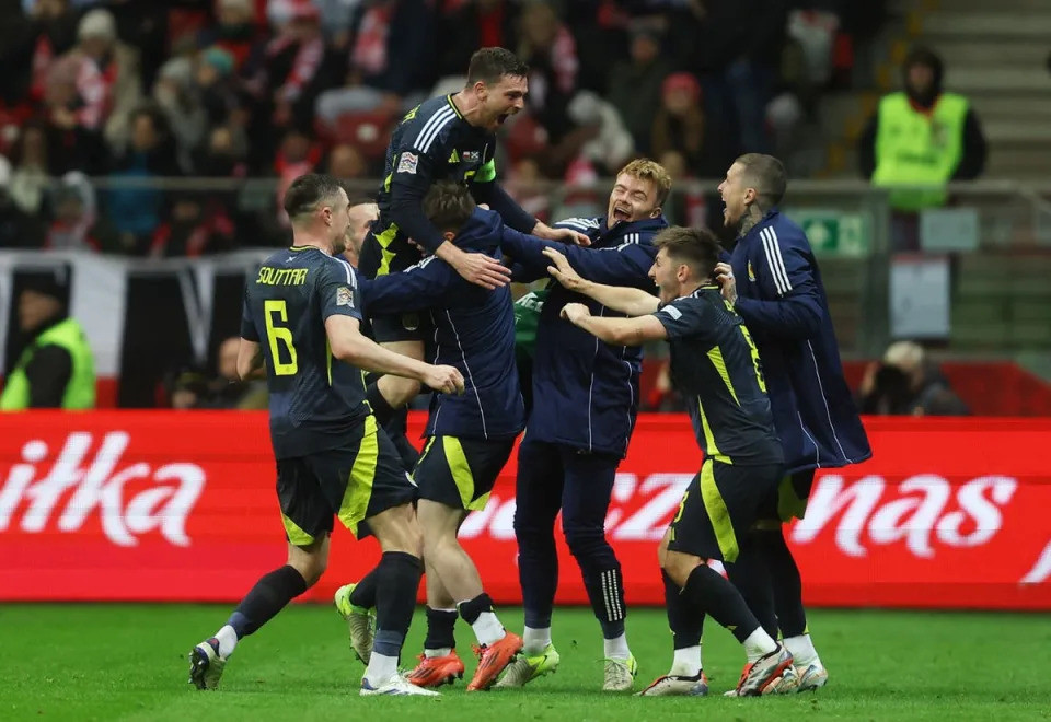 Andy Robertson marked his 80th cap with a sensational stoppage-time winner in Poland to retain Scotland’s hopes of staying in the top level of the UEFA Nations League