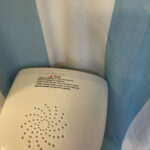 Carefully use the steamer by the shirt