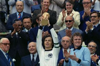 West Germany captain Franz Beckenbauer lifts the World Cup after victory over the Netherlands in the 1974 final