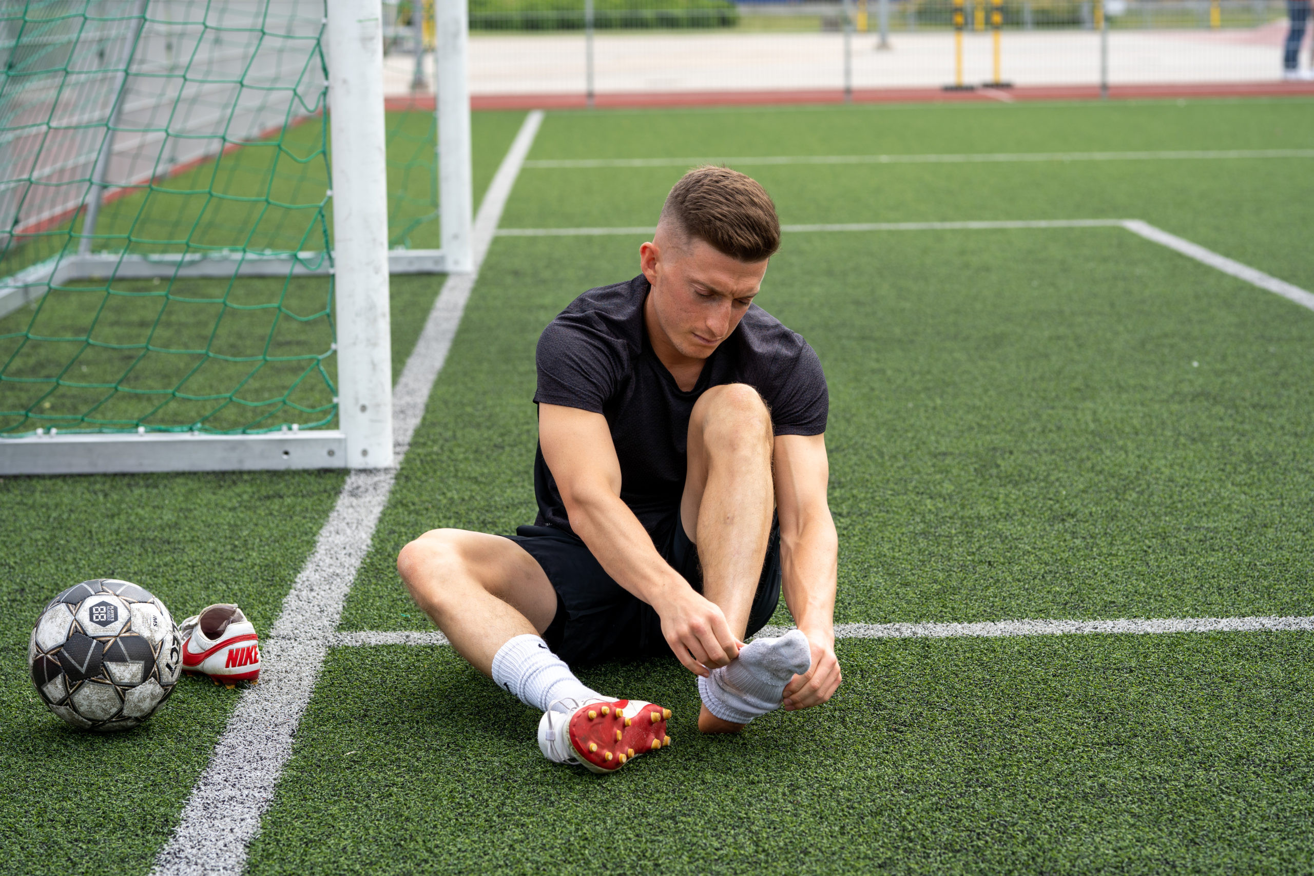 Footballer preparing for a game