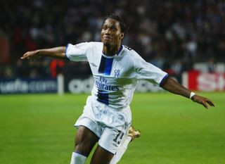 Didier Drogba celebrates after scoring for Chelsea against Paris Saint-Germain in 2004.