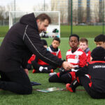 Coach with players