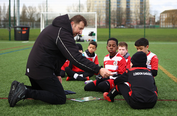 Coach with players