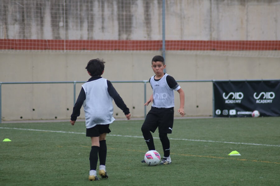 Football training drills at SIA Academy, focusing on technique and physical conditioning