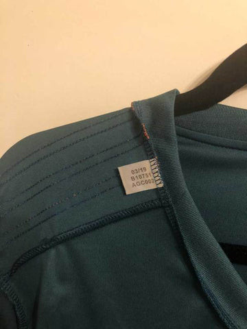 Examples of fake product code tags with codes that don't match the shirt