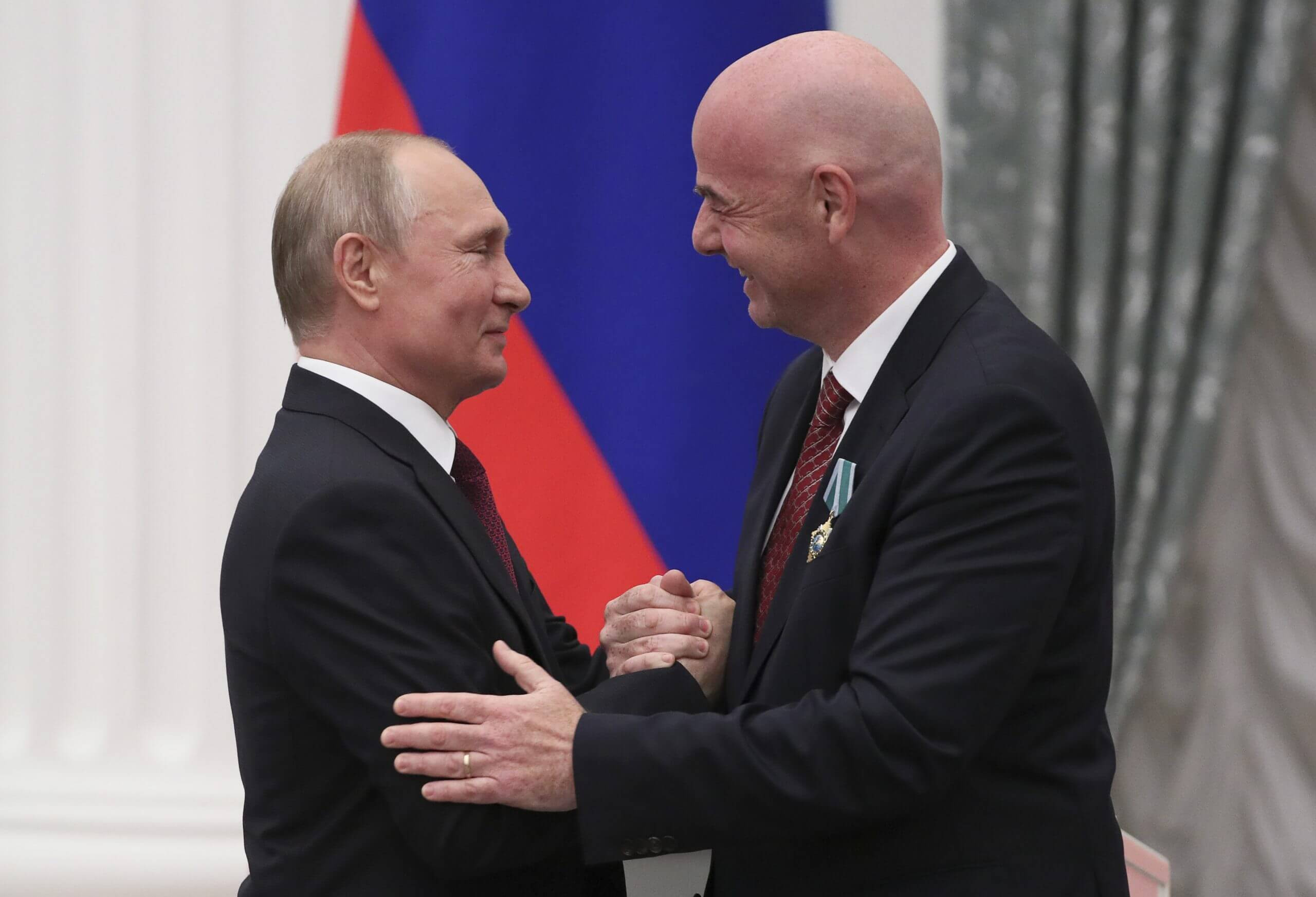 Putin with FIFA president Gianni Infantino in 2019