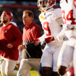 Saban runs out with team ahead of CFP semifinal against Michigan. (Photo: Ryan Kang / Getty Images)