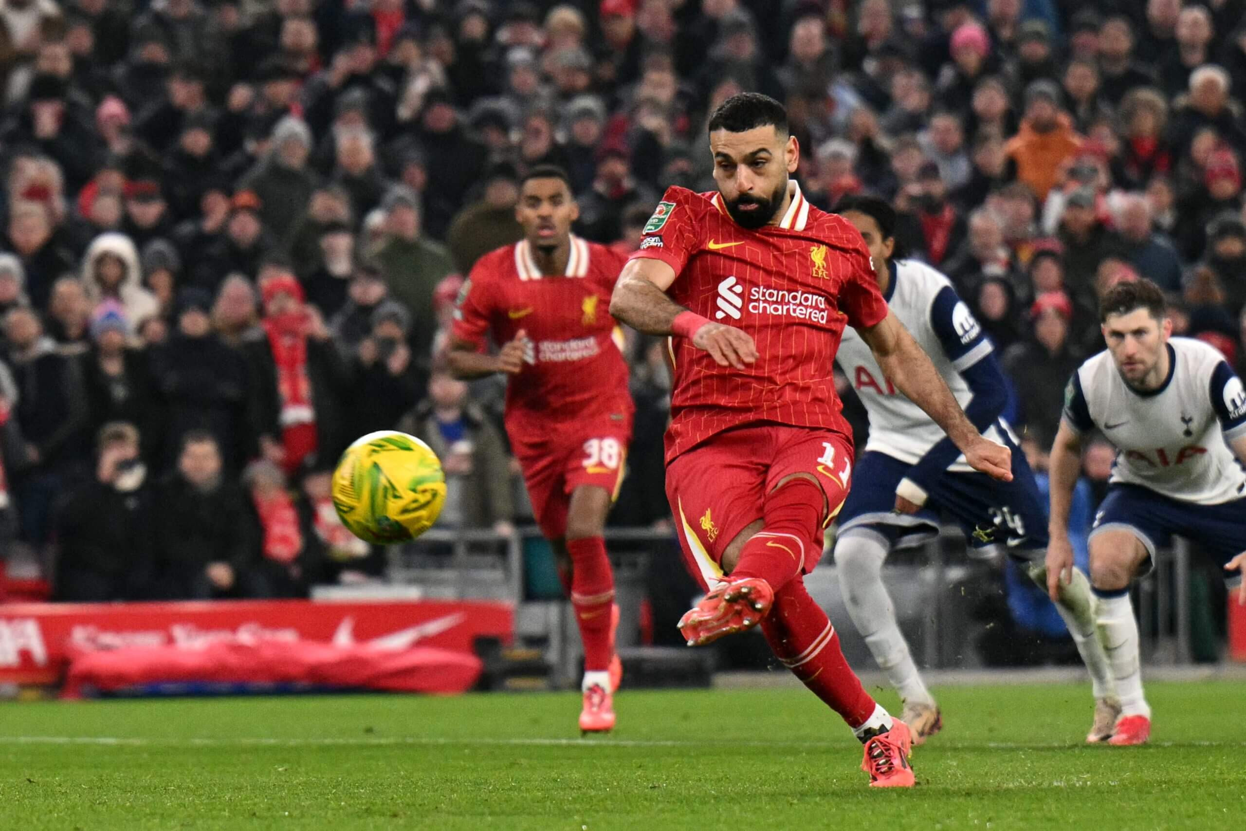 Mohamed Salah scores against Tottenham in the Carabao Cup semi-finals in February