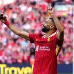 Mohamed Salah celebrating his second Premier League title with a goal against Tottenham Hotspur on Sunday – and a selfie