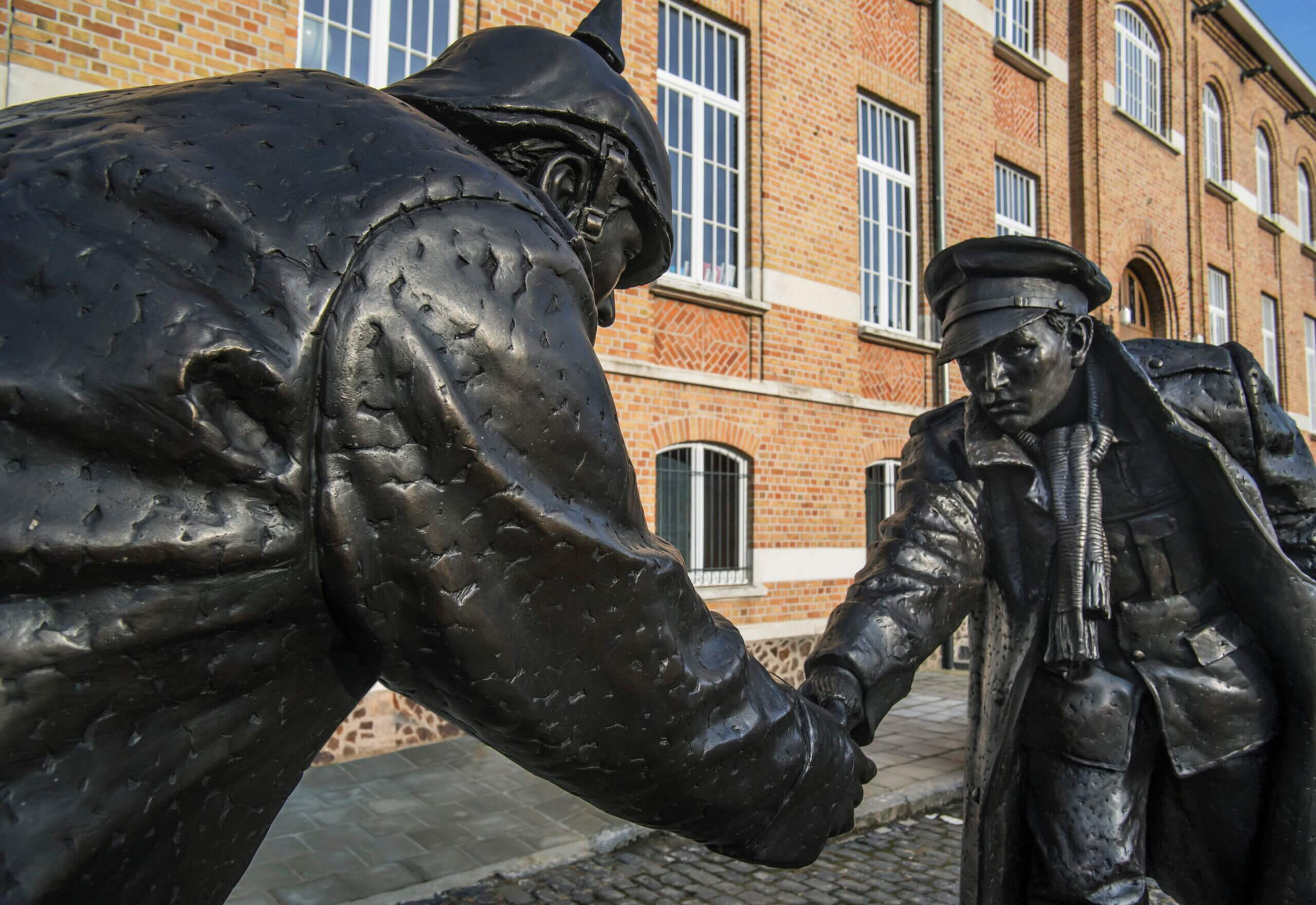 A statue in Mesen, West Flanders, commemorating the Christmas Truce, featuring soldiers playing football