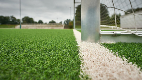 Artificial grass football pitch showcasing its green surface