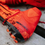 Muddy football boots in need of cleaning