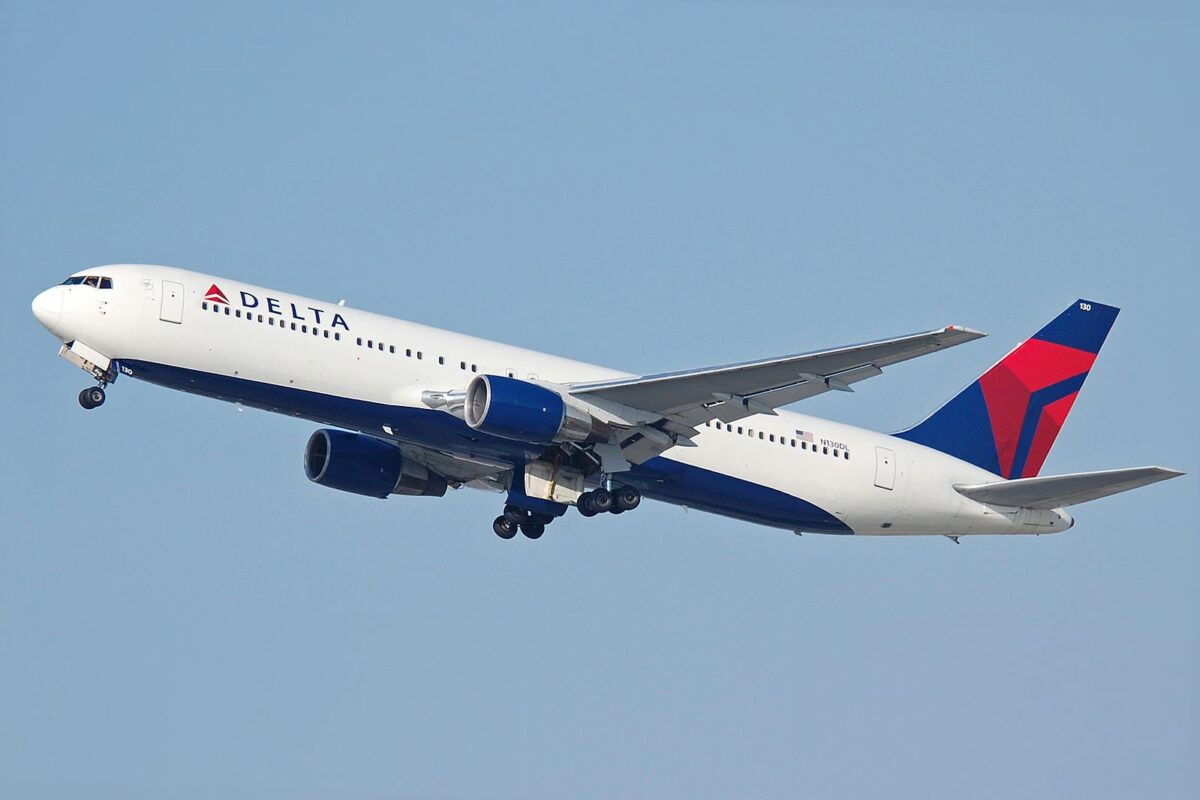 Delta Boeing 767 on the tarmac, waiting for an NFL team