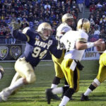 Defensive player sacking the quarterback